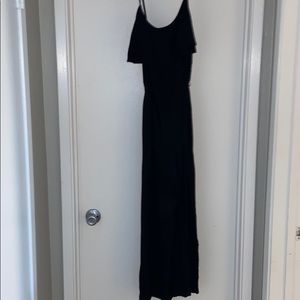 Black mid length jump suit.